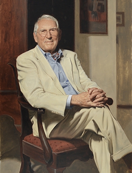 commissioned portrait of an elderly man in cream-colored suit in a relaxed position, with fingers together and legs crossed. 