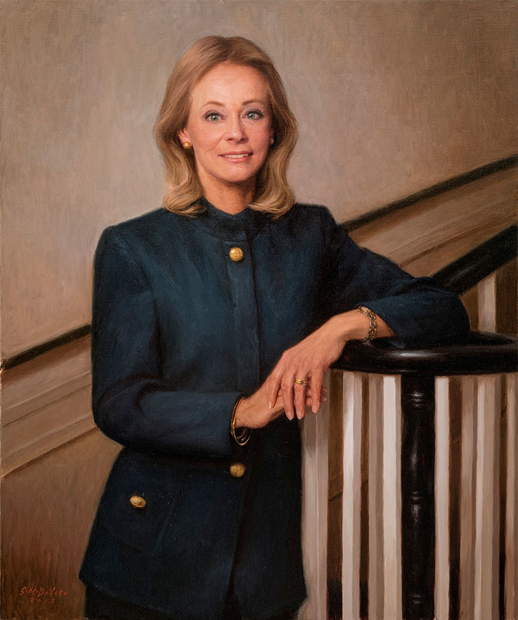 commissioned portrait of a blond-haired woman in button-up blue pants suit.